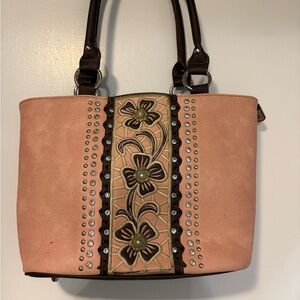 Pink and brown concealed carry purse with matching wallet